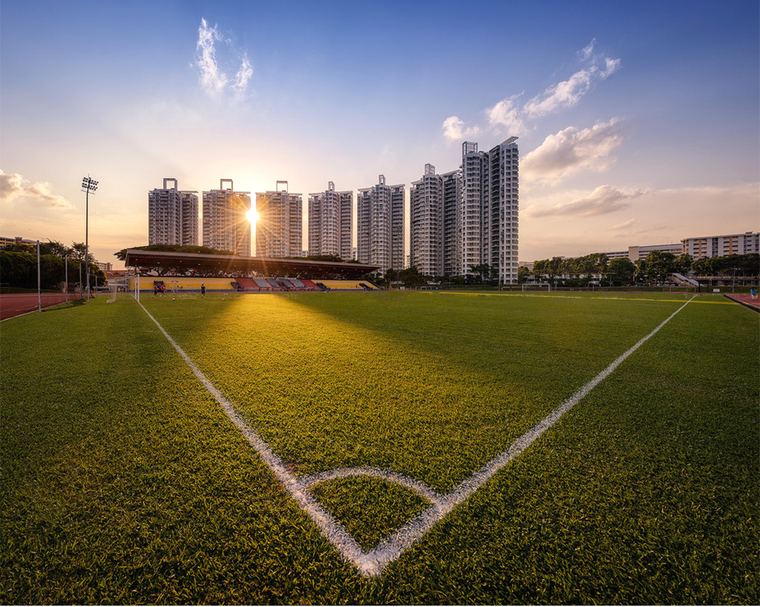 Corner of the pitch under floodlight