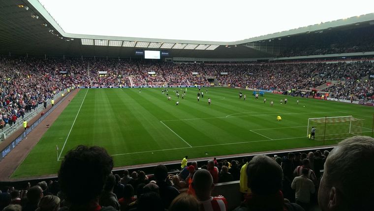 Crowd behind the goal at kick-off