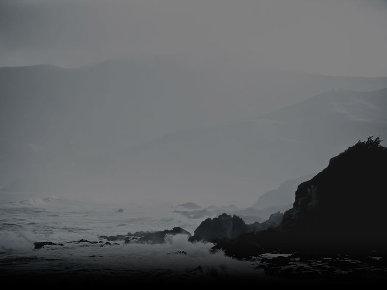 Coastal cliffs in flat monochrome light