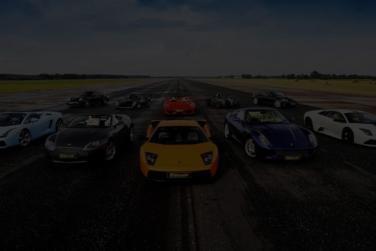Cars on a floodlit circuit
