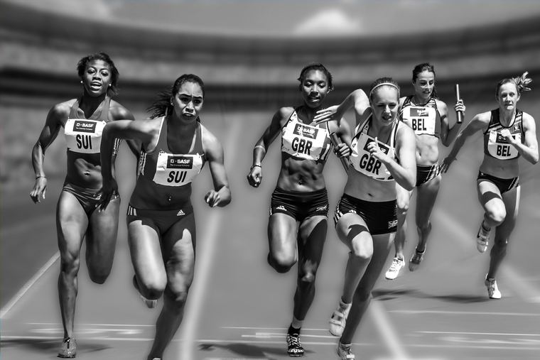 Sprinters at full stride, converted to monochrome